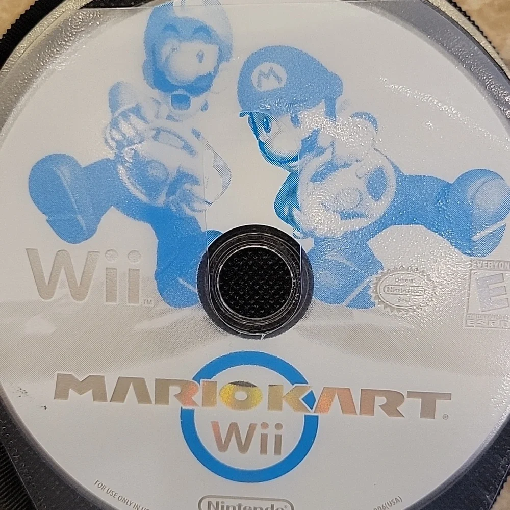 Wii Games/CDs Set of 3 w/ Case Logic Case
